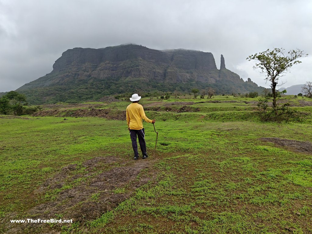 Naneghat reverse waterfall trek route with Jivdhan fort in background